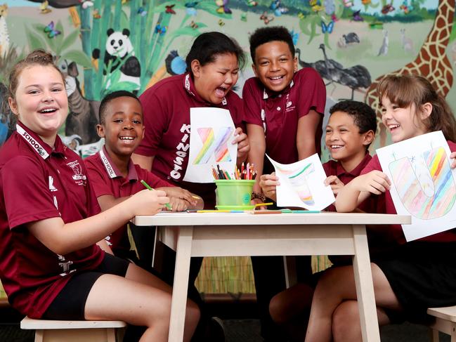 Year 5 students Eva Ingram, Melchior Muhindo, Sara Siaosi, Tyreese Sesay, John Loumoli and Daisy Fletcher at Kingston State School as Children's Week kicks off with hundreds of schools teaching kids about their human rights by creating an alphabet linked to each human right for kids. Pics Tara Croser.