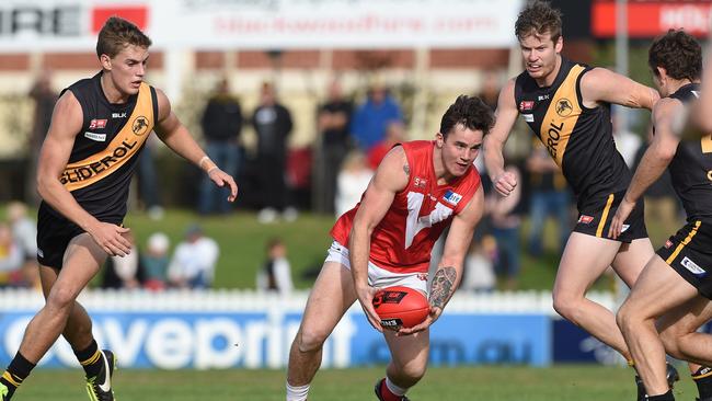 13/6/16 SANFL: Glenelg v North Adelaide at Glenelg Oval. Sam De Leonardis (North Adelaide) surrounded by tigers. Picture Roger Wyman