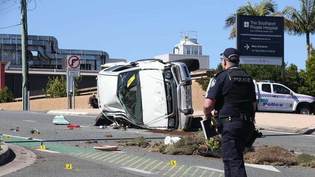 Police investigating the crash at the corner of Queen and Nerang St in Southport. Picture: Glenn Hampson.