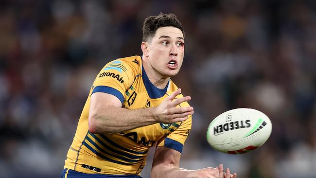 SYDNEY, AUSTRALIA - JUNE 12:  Mitchell Moses of the Eels passes the ball during the round 15 NRL match between Canterbury Bulldogs and Parramatta Eels at Accor Stadium on June 12, 2023 in Sydney, Australia. (Photo by Matt King/Getty Images)