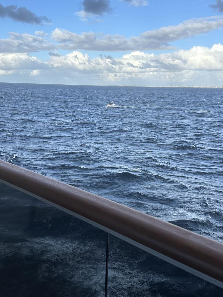 Police boats circle amid a frantic search and rescue off Sydney.