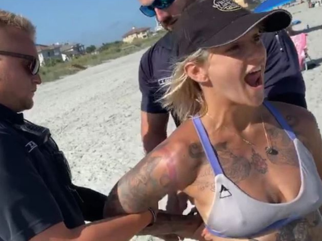 Woman handcuffed for wearing tiny bikini on beach fights for law change news.au — Australias leading news site pic