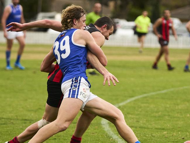 Jonathan Read and Nicholas Murphy in the match between Rostrevor OC and St Peters at Campbelltown Memorial Oval in Paradise, Saturday, June 5, 2021. Picture: MATT LOXTON