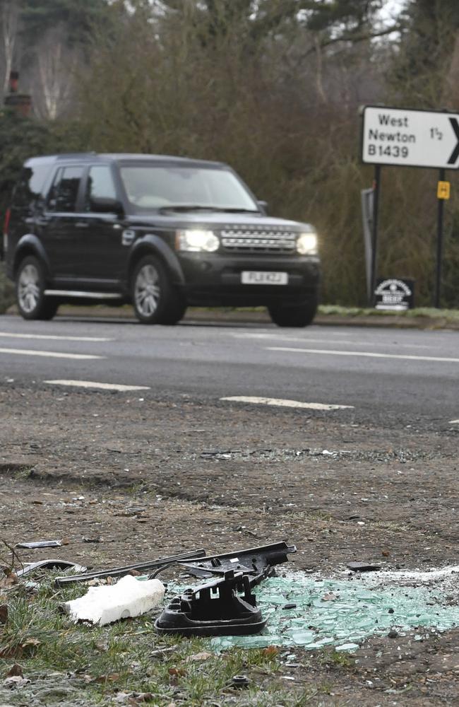 Broken glass and car parts on the road side near to the Sandringham Estate, England, where Prince Philip was involved in a car accident. Picture: AP