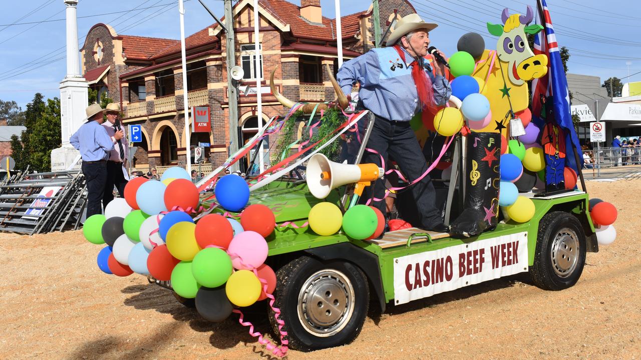 Here comes Brenda Armfield on her mini moke in the Beef Week Parade last year.