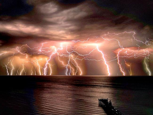 Amazing image captured from Glenelg of the lightning storm in South Australia . Picture : Elias Arcondoulis