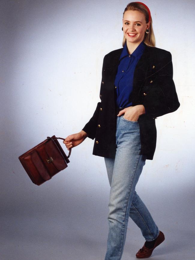 A popular look in 1992: Levi 501 jeans, belt, suit jacket with shoulder pads, collared shirt, headband and briefcase-style bag.