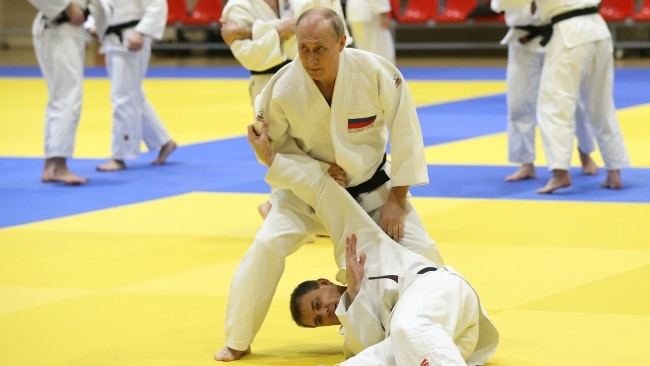 Russian President Vladimir Putin has been stripped of his taekwondo belt by World Taekwondo. He competes here in a Judo training. Picture: Mikhail Svetlov/Getty Images