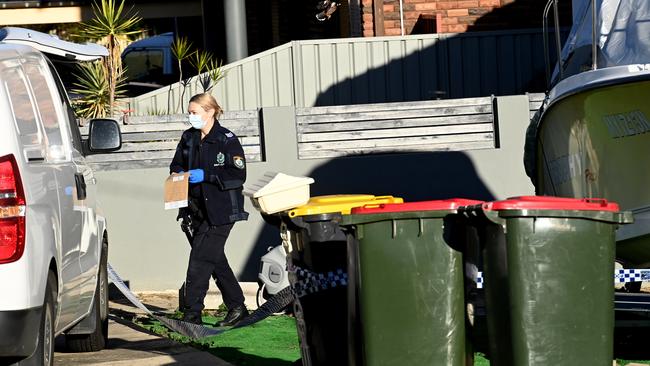 Police at the Bexley home on Thursday. Picture: Jeremy Piper