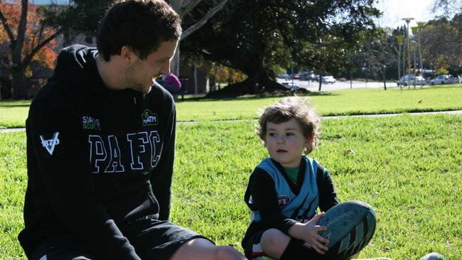 Ryan Lane-Ellis with Port Adelaide's Travis Boak. Picture: Supplied