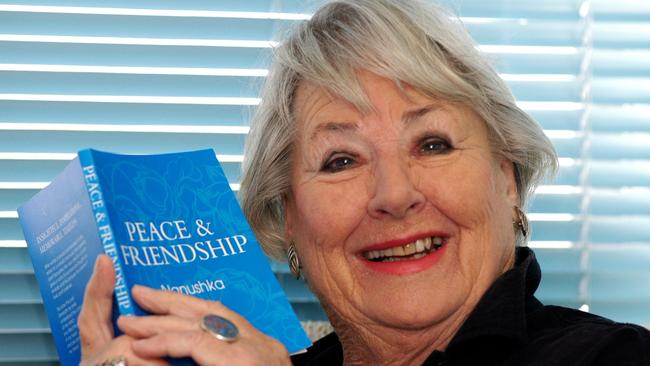 Nan Witcomb with in 2005 with her book Peace and Friendships. Picture: Ray Murray