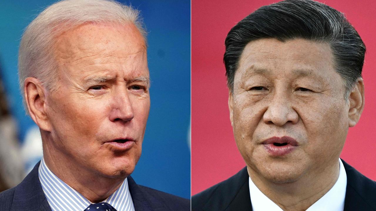 China’s Chairman Xi Jinping has warned US President Joe Biden not to “play with fire”. Picture: MANDEL NGAN and Anthony WALLACE / AFP.