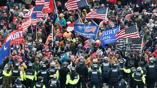 Trump supporters clash with police and security forces as they storm the US Capitol in Washington. Picture: AFP.