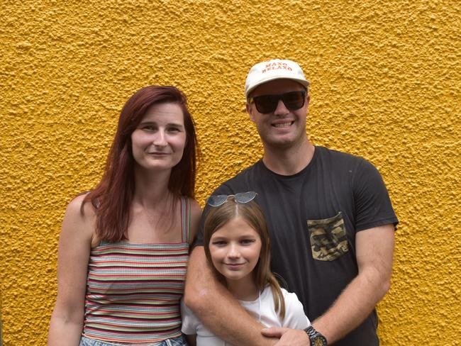 Brisbane's Danielle and Cameron Marshall with their daughter Hannah, who busted out some songs on Stanthorpe's streets at the Apple and Grape Festival 2024