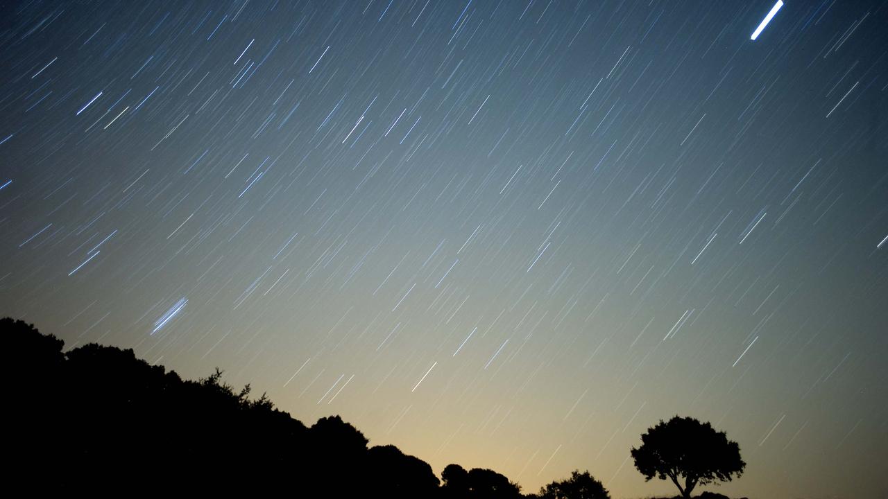 Time lapse photography combines lots of photos taken over many hours to show the beauty of this meteor shower over Spain.