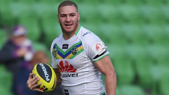 Brenko Lee runs in to score a try during a Holden Cup match.