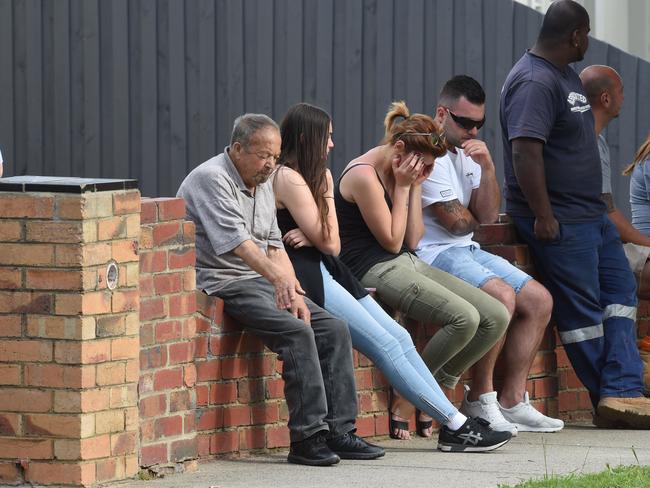 Shocked people near where Mr Di Berardino’s body was found. Picture: Kylie Else