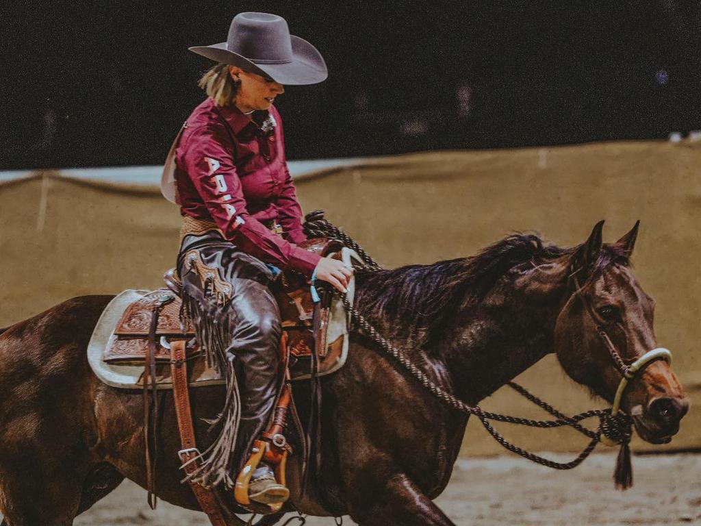 Billie Dries competes in reined cow horse with her horse Senorita (Cowpokin Catt)