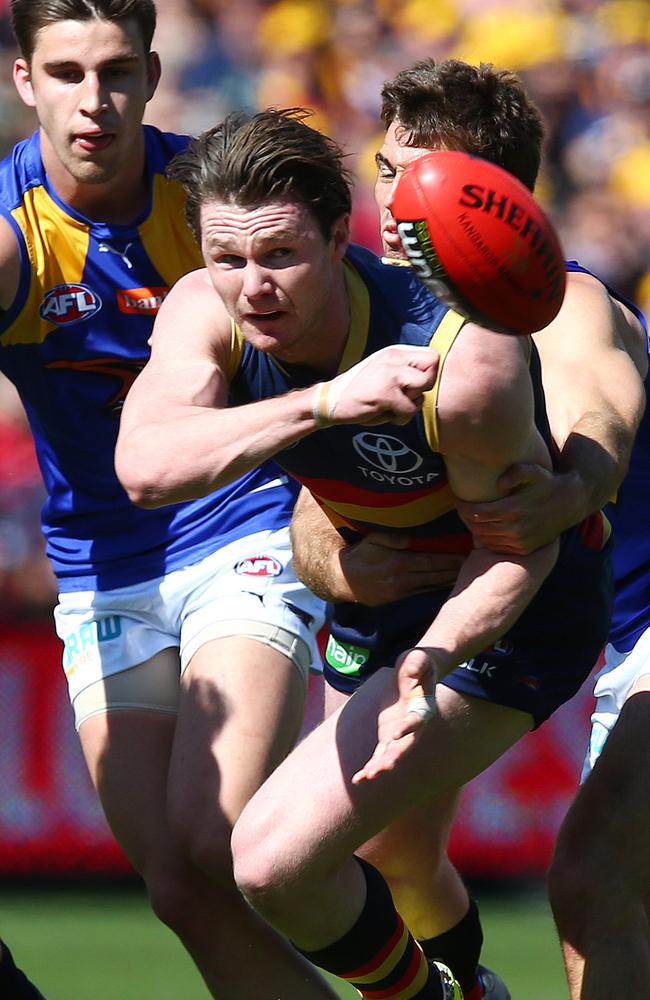 Patrick Dangerfield gets his handpass away at Adelaide Oval. Picture: Sarah Reed.