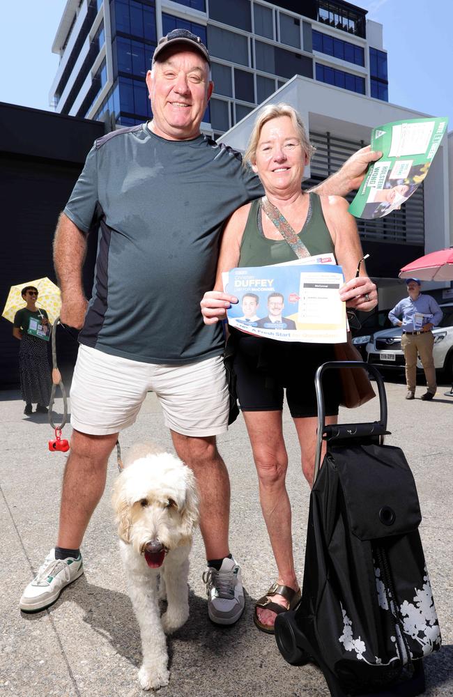 Paul and Sisse Newton with their dog Ollie, voting early in Fortitude Valley. Picture: Steve Pohlner