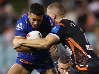 SYDNEY, AUSTRALIA - FEBRUARY 21:  Isaiah Iongi of the Eels is tackled during the 2025 NRL Pre-Season Challenge match between Wests Tigers and Parramatta Eels at Leichhardt Oval on February 21, 2025 in Sydney, Australia. (Photo by Mark Metcalfe/Getty Images)