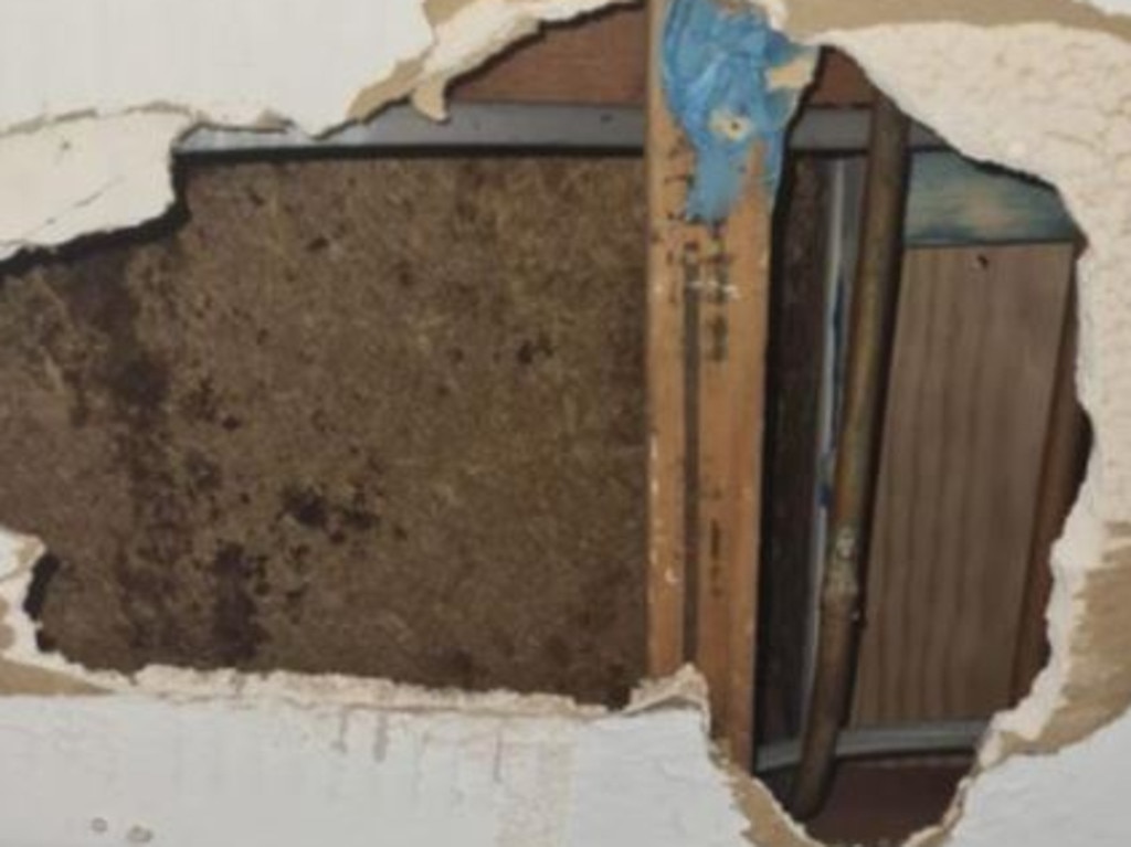 A hole in the wall of the townhouse. Picture: 7NEWS