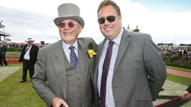 Lloyd Williams and his son Nick after Almandin won the 2016 Melbourne Cup. Picture: David Caird