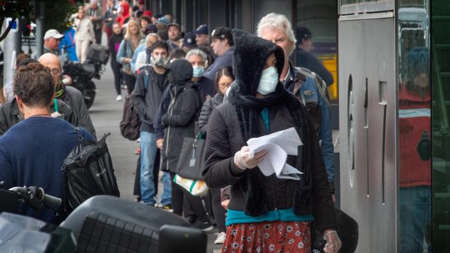 Queues outside the Abbotsford Centrelink during the coronavirus crisis. Picture: Tony Gough