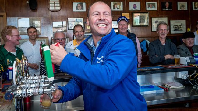 Josh Frydenberg shouts the bar at Auburn Bowls Club. Picture: Jake Nowakowski