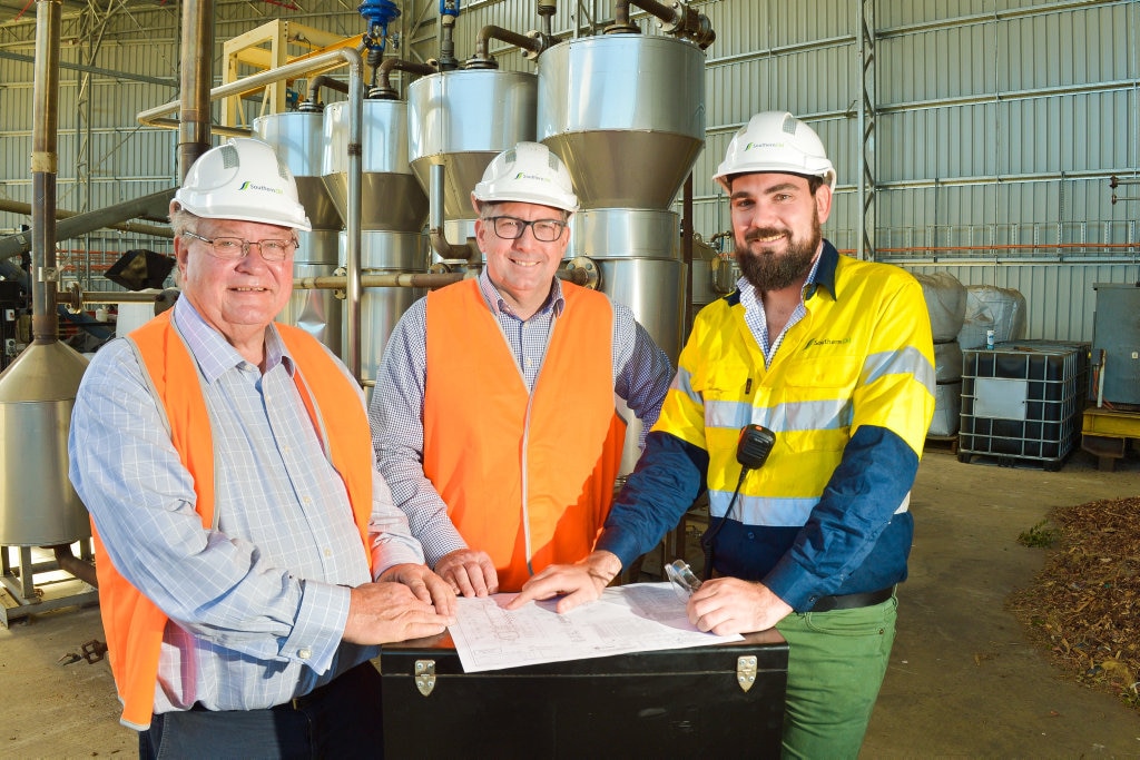 Member for Flynn Ken ODowd, Southern Oil general manager Ben Tabulo and Assistant Minister to the Deputy Prime Minister look at the plans for the Australian-first hydrogen fuel cell which is expected to arrive at the Yarwun site in November. Picture: Mike Richards GLA160718NOIL