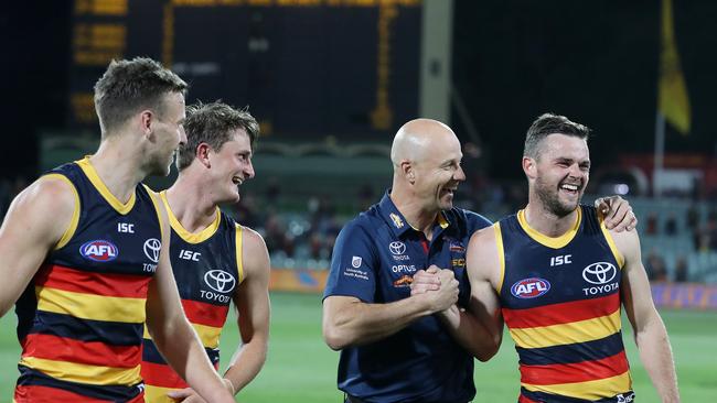 Brad Crouch has a laugh with coach Matthew Nicks after the Crows’ win over GWS this year. Picture: Sarah Reed