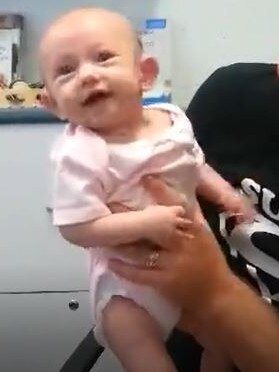 Baby Emelia Shadwell when she first hears sound after being fitted with hearing aids. Picture: Supplied