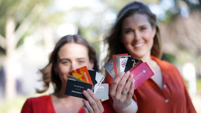 Shoppers Eliza Cavalletto and Emma Reeves use loyalty cards to get bonuses when they shop. Picture: Christian Gilles.