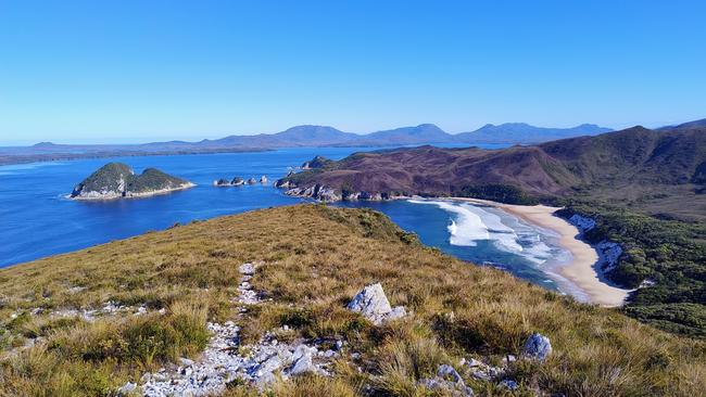 View of Toogelow Beach and Kathleen Island from Mount Milner, Southwest Tasmania. Picture: David Johnson. Your Focus on Tasmania **ONE TIME USE ONLY**
