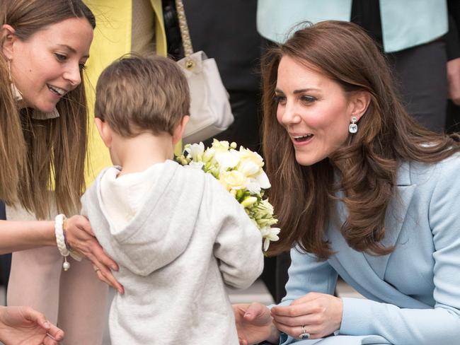 Kate Middleton: Little boy presents royal with flowers, then hides ...