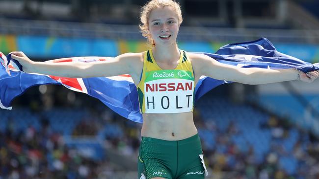 Isis Holt celebrates her silver medal in the T35 100m final.