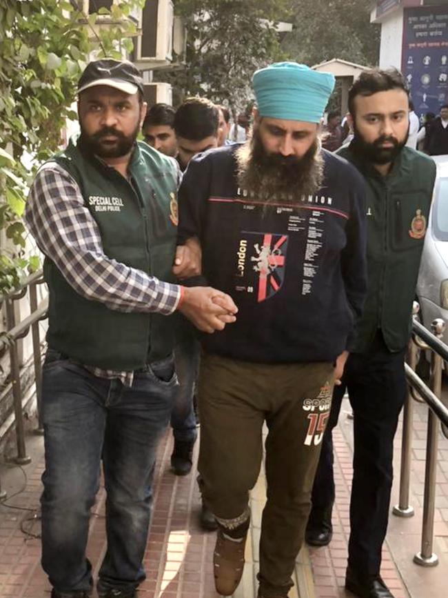 The arrest of Rajwinder Singh in India. Picture: Tawqeer Hussain