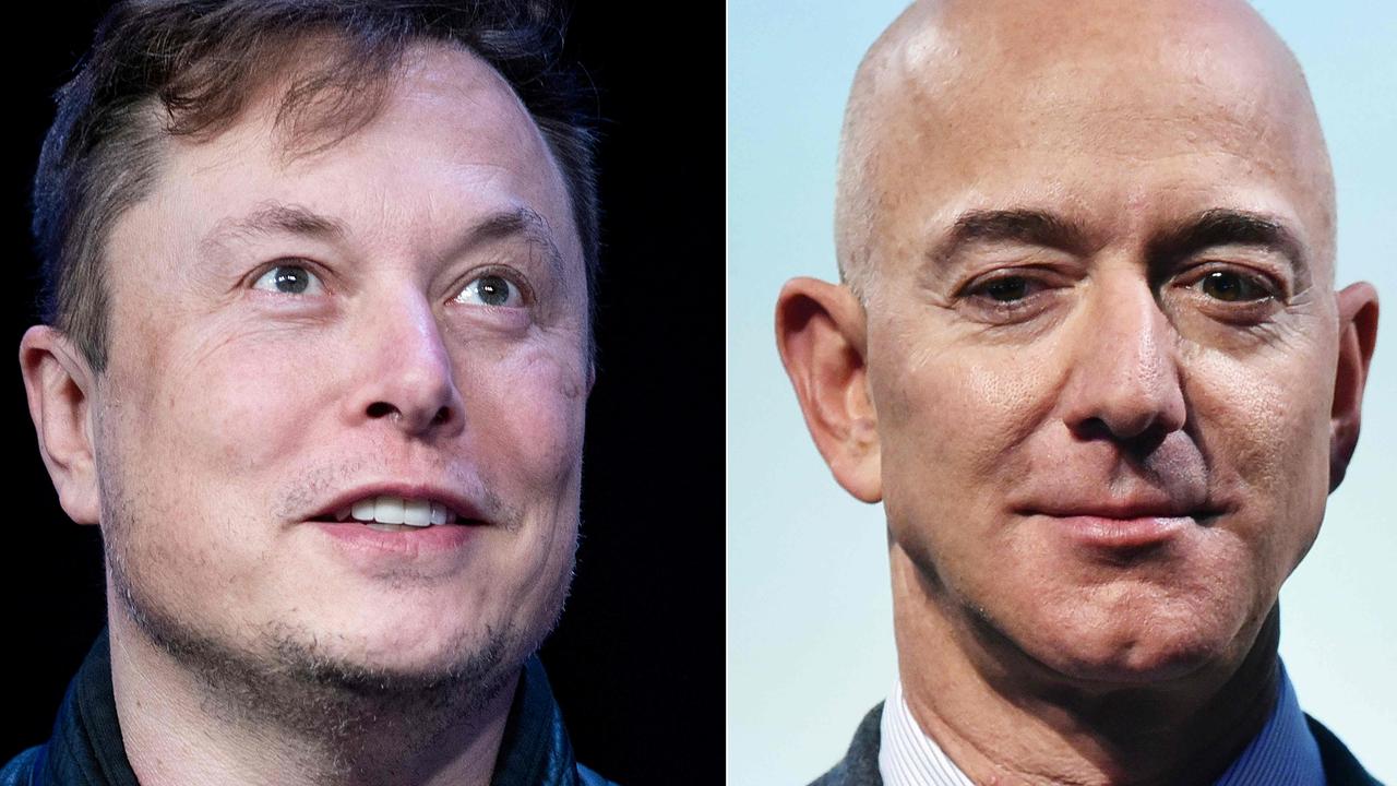 SpaceX founder Elon Musk and Blue Origin founder Jeff Bezos. Picture: Brendan Smialowski and Mandel Ngan/AFP