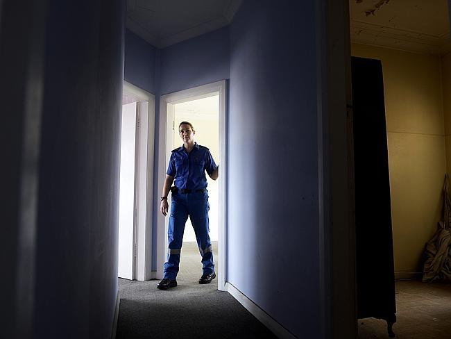 Annmarie Delahunty, duty operations manager, Central Coast, inspects the upstairs section, of the old Wyong Ambulance Station, where many paramedics have reported paranormal activity. 