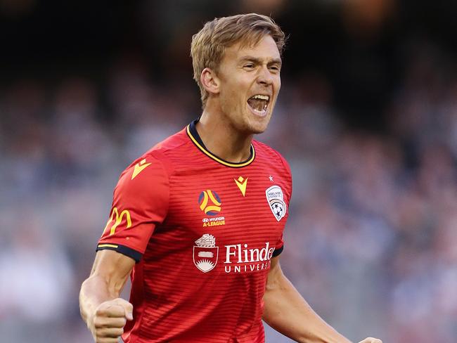 Kristian Opseth of Adelaide United celebrates his goal  during the Round 21 A-League match between the Melbourne Victory and the Adelaide United at Marvel Stadium in Melbourne, Saturday, February 29, 2020. (AAP Image/George Salpigtidis) NO ARCHIVING, EDITORIAL USE ONLY