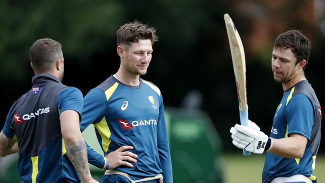 Cameron Bancroft, centre, with Matthew Wade, left, and Travis Head at the Edgbaston nets