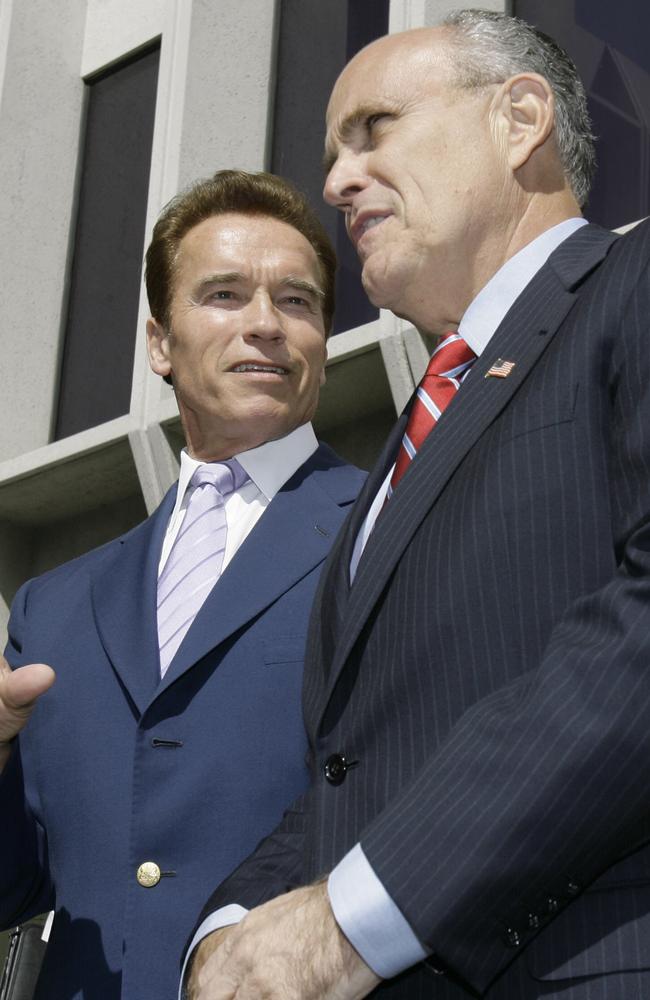 Rudy Giuliani had a failed bid for president in 2007, pictured here with then-California governor Arnold Schwarzenegger. Picture: Nick Ut/AP