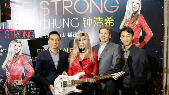 Malaysian transgender popstar Jessie Chung (second from the left) next to Gary Scallan (third from the left) whose company is owned $977,000 by failed Gold Coast business Nature Pacific.