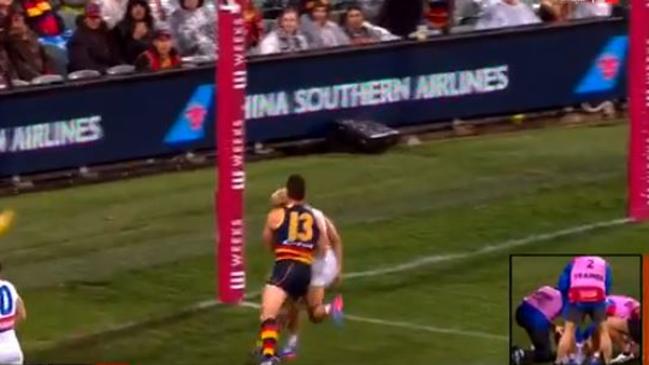 Taylor Walker pushes Jason Johannisen into goalpost