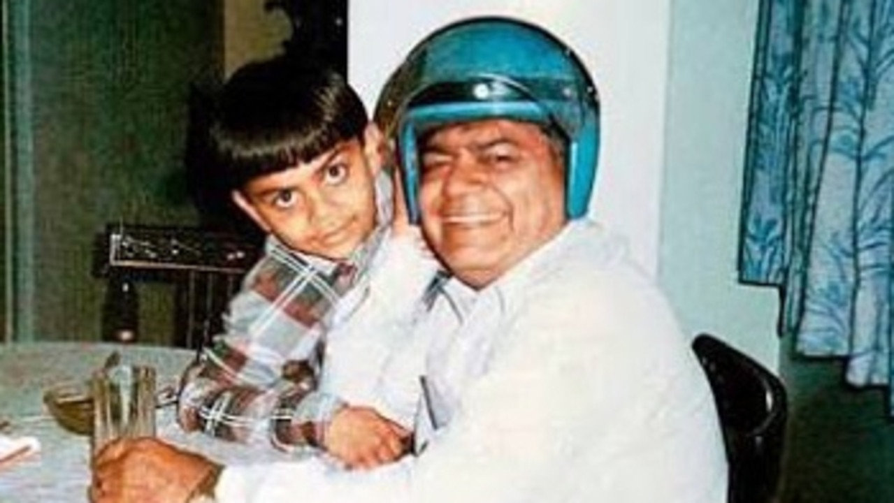 Virat Kohli with his dad Prem.