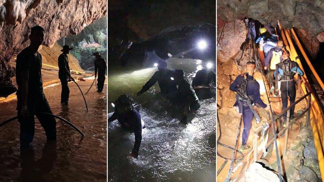 In this handout photo released by Tham Luang Rescue Operation Center, Thai rescue teams walk inside cave complex where 12 boys and their soccer coach went missing, in Mae Sai, Chiang Rai province, in northern Thailand, Monday, July 2, 2018. Rescue divers are advancing in the main passageway inside the flooded cave in northern Thailand where the boys and their coach have been missing more than a week. (Tham Luang Rescue Operation Center via AP)