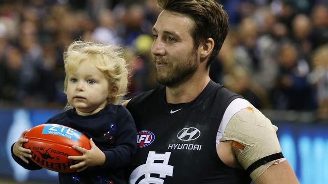 Dale Thomas with his young daughter, Tilly. Picture: Michael Klein