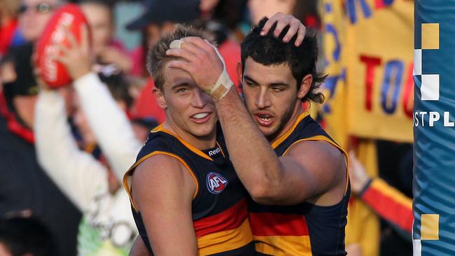 AFL football – Round 14 Adelaide Crows vs. Richmond match at AAMI Stadium – footballer Bernie Vince and Taylor Walker. Picture: Cross Simon