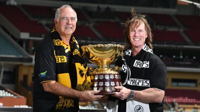 Peter Carey and Greg Anderson will deliver the premiership Cup to the SANFL grand final on Sunday. Picture: Sam Wundke/AAP