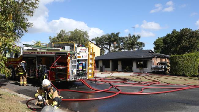 The remains of the house and ute after firefighters had extinguished the blaze. Picture: Glenn Hampson